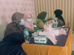 Desa Cibuntu Kecamatan Ciampea Mengadakan Vaksinasi di Aula Kantor Desa